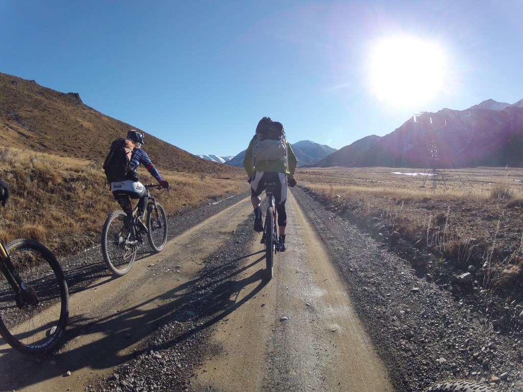 Riding along the gravel road to the start of the track.