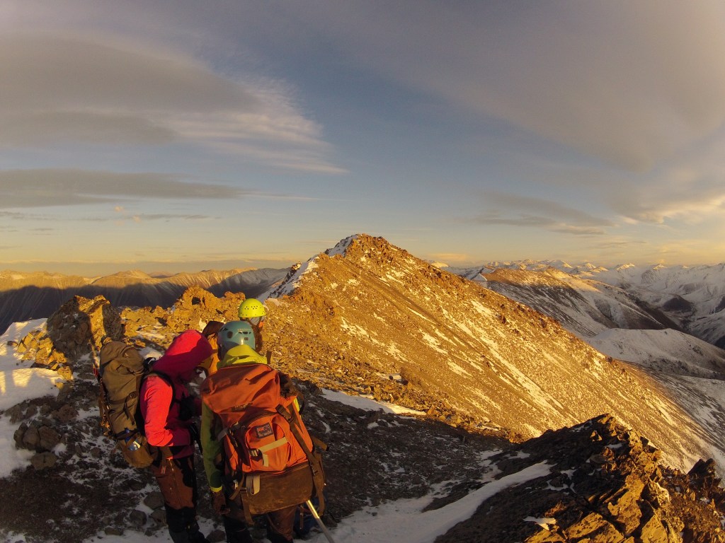 Consulting the map at the drop in point on the ridge
