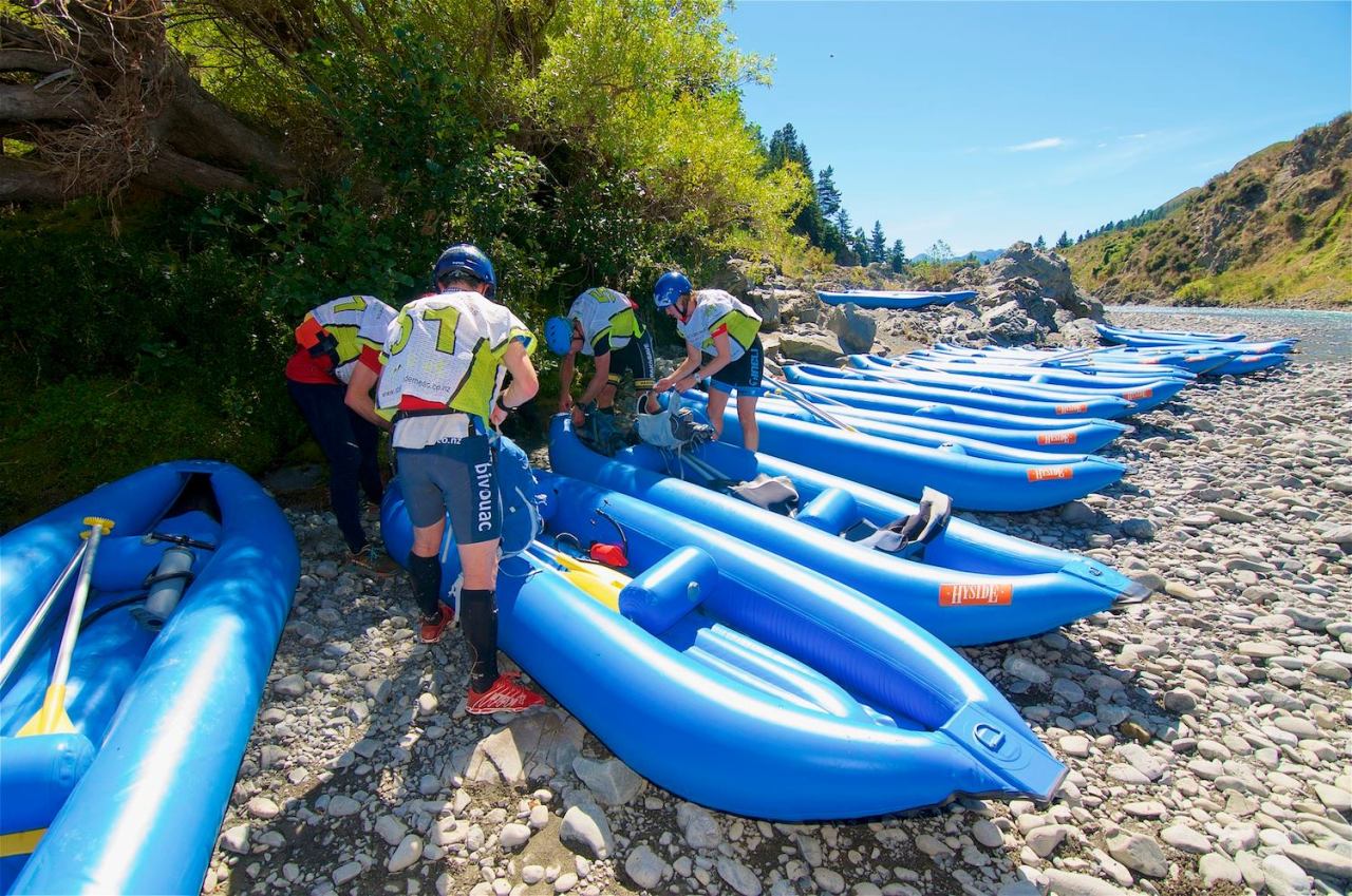 Getting in the Godzone canoes for the canoe down the Waiau